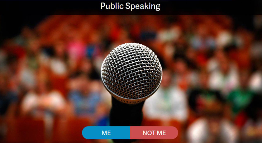 image of microphone with audience in background